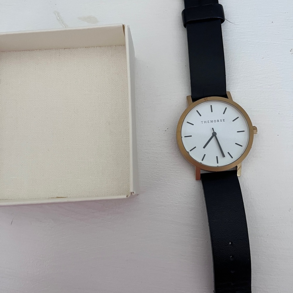 The Horse black and gold watch